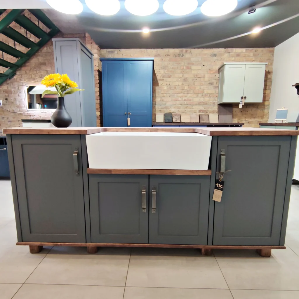 Blue Double Butler Sink Showroom Front A Front View Of A Blue Double Butler Sink Cabinet In A Showroom