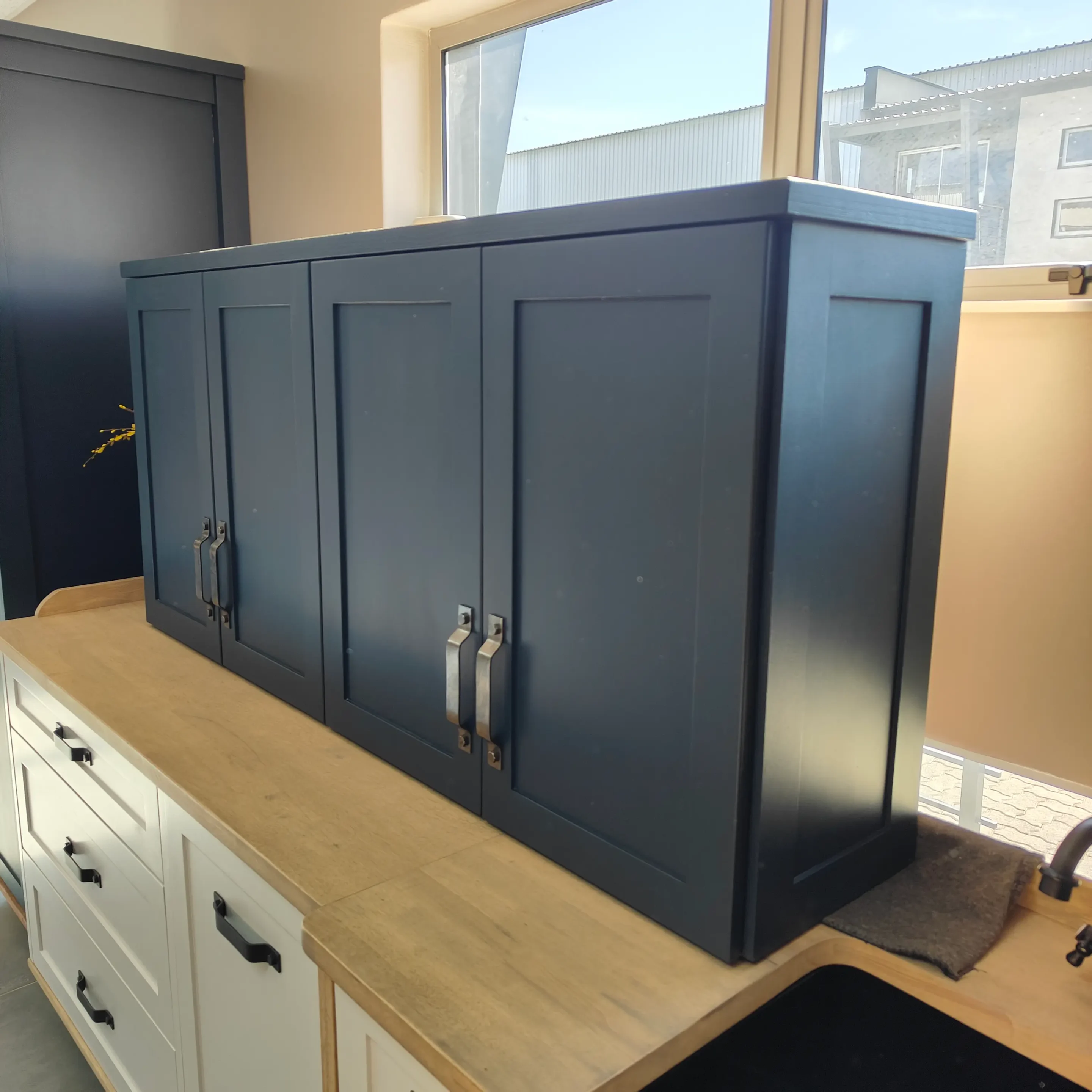 Blue Double Door Wall Cabinet Two Blue Double Door Wall Cabinet With Shaker Doors In A Kitchen