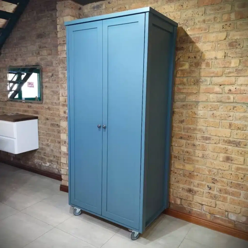 Double Door Pantry Blue A blue double door pantry in a kitchen