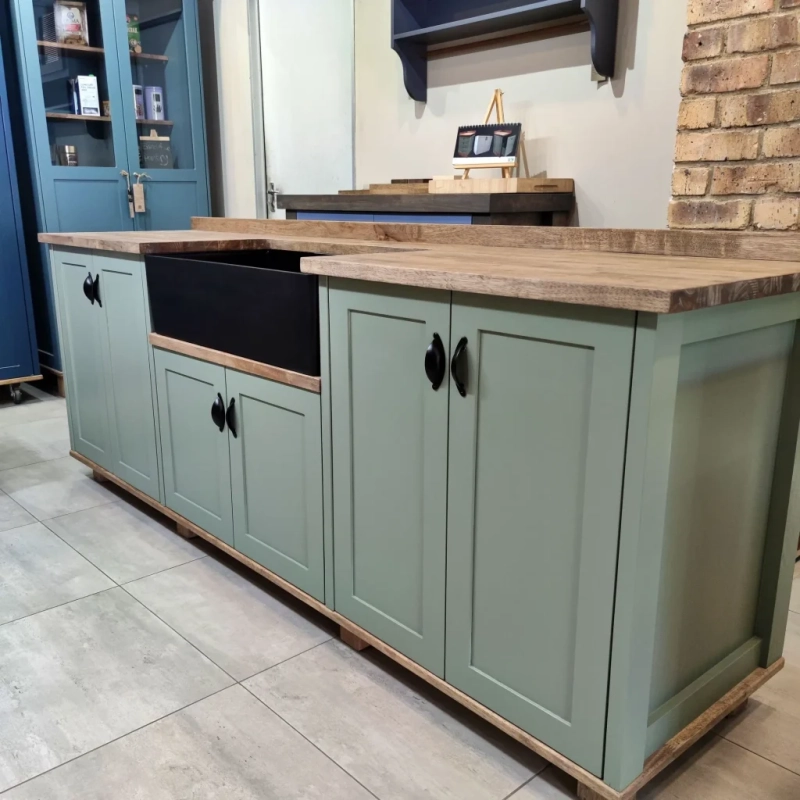 Green Double Butler Sink Kitchen Right A Right View Of A Green Double Butler Sink Cabinet In A Showroom