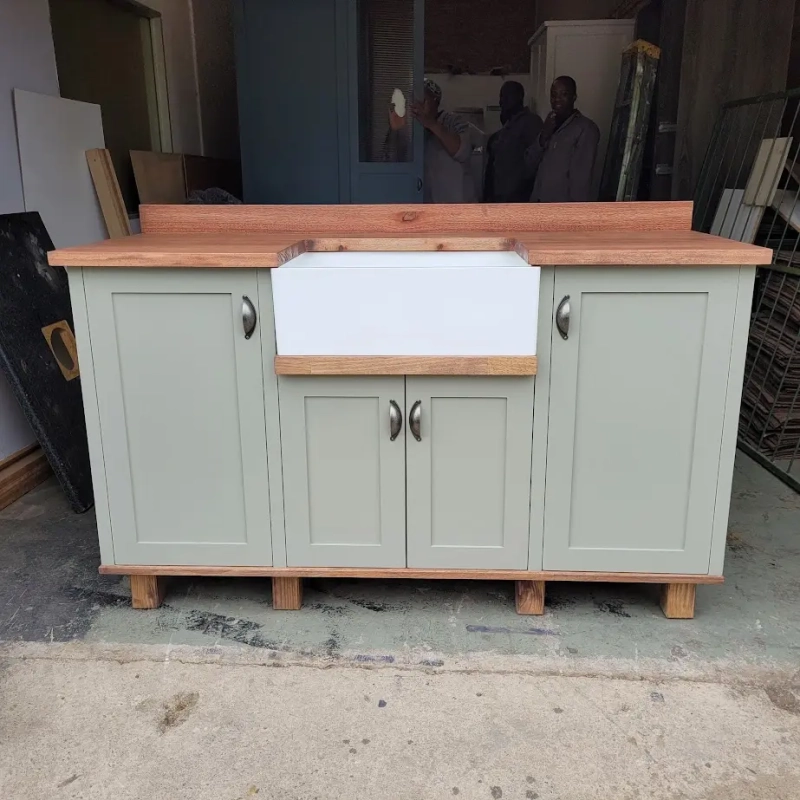 Green Single Butler Sink Warehouse A Front View Of A Green Single Butler Sink Cabinet In A Warehouse