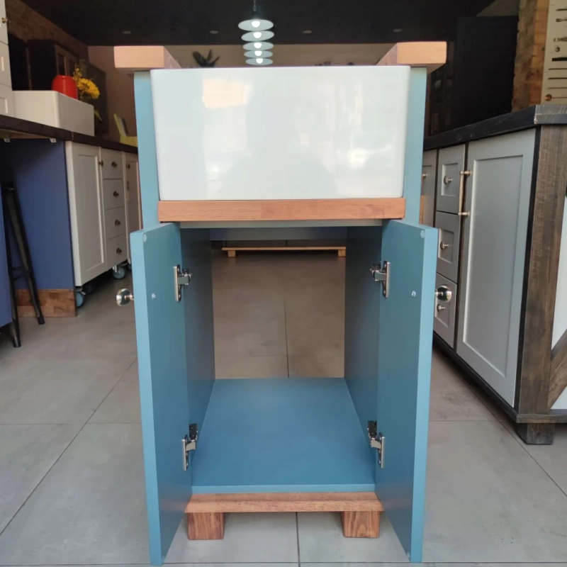 Open Blue Baby Butler Sink Showroom A Front View Of An Open Blue Baby Butler Sink Cabinet In A Showroom