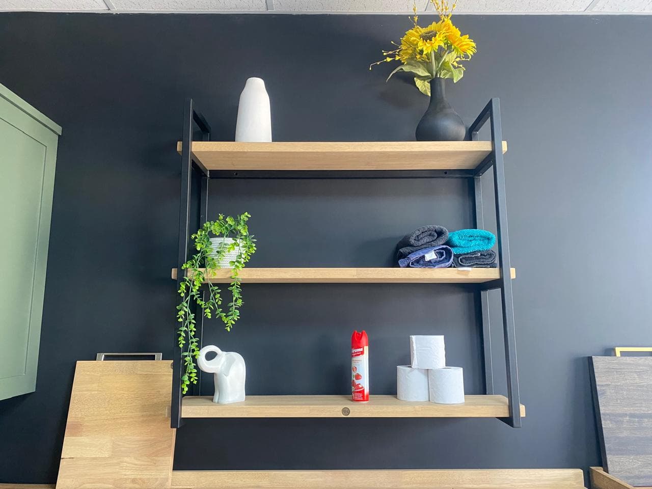 Three Tier Metalica Shelf Bathroom Showroom A Three Tier Metalica Shelf Holding Toiletries In A Showroom