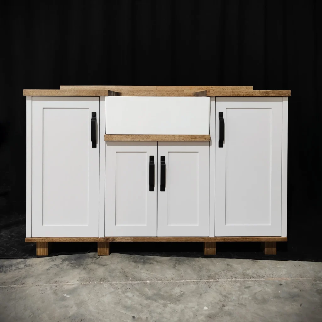 White Single Butler Sink Warehouse A Front View Of A White Single Butler Sink Cabinet In A Warehouse