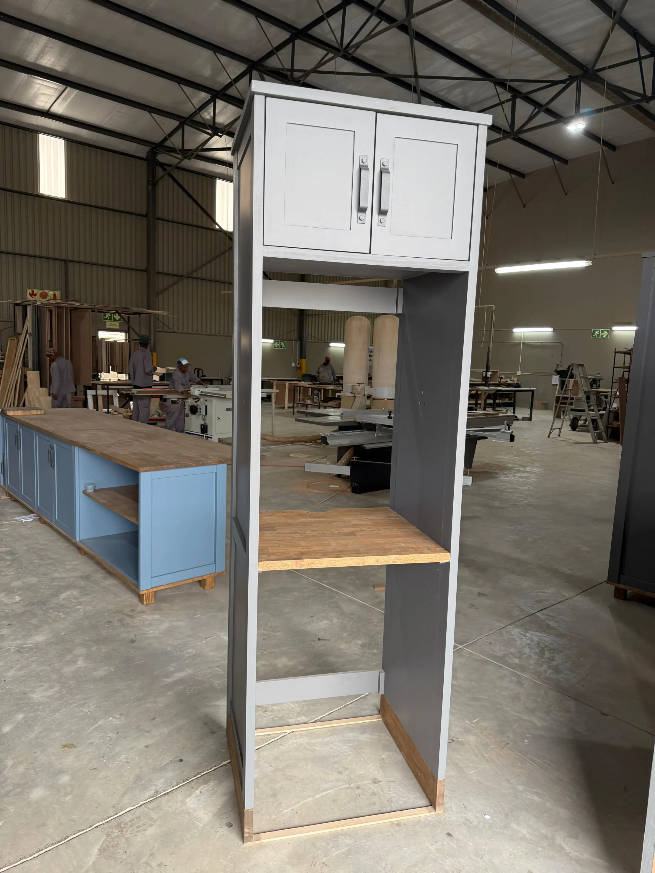 Blue Washing Machine House Warehouse A Blue Washing Machine House Cabinet In A Warehouse