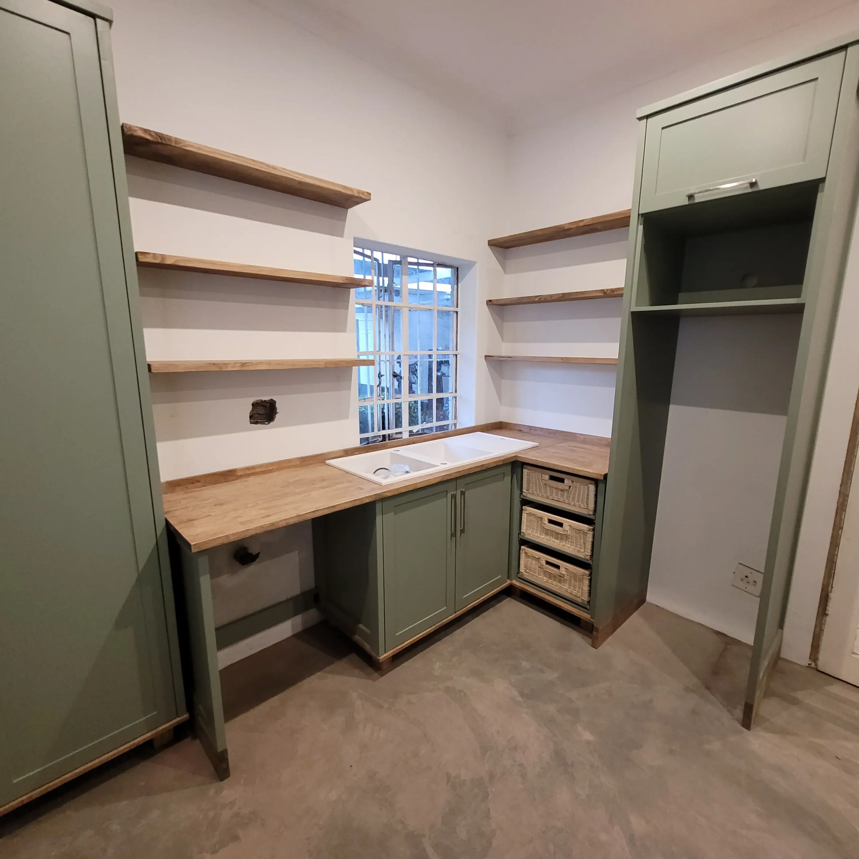 Full Green Kitchen Set A Full Green Kitchen Set Including A Fridge House, A Appliance Panel Cabinet And A White Double Sink