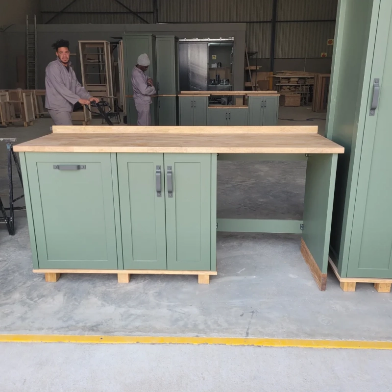 A Front View Of A Green Appliance Panel Cabinet In A Warehouse