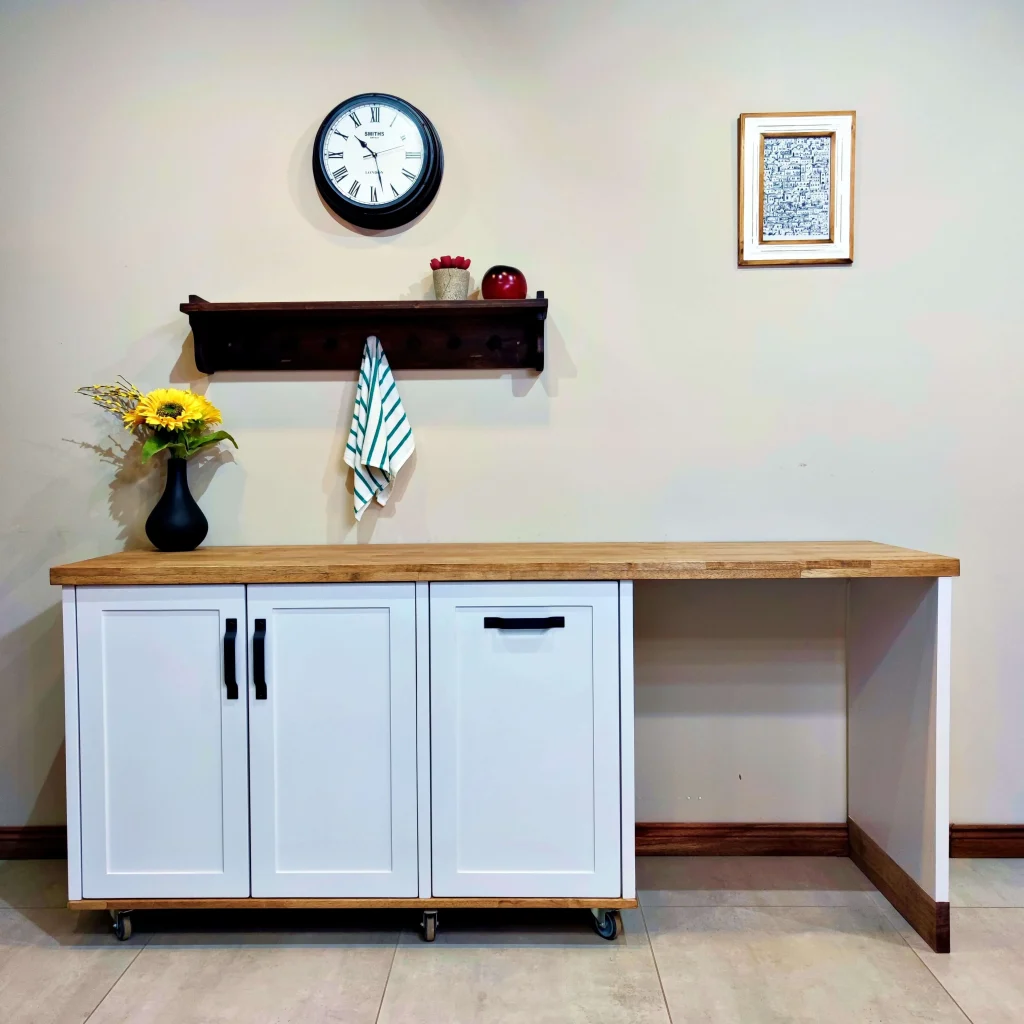 White Appliance Panel A White Appliance Panel Cabinet And A Wall Shelf In A Home