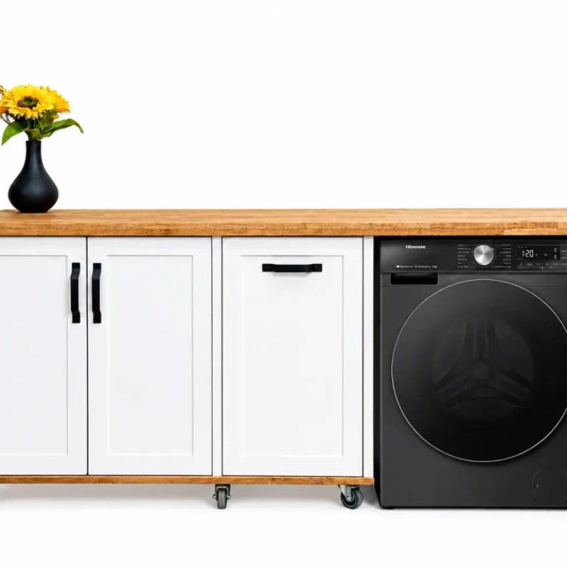 A Front View Of A White Appliance Panel Cabinet With A Black Washing Machine On A White Background